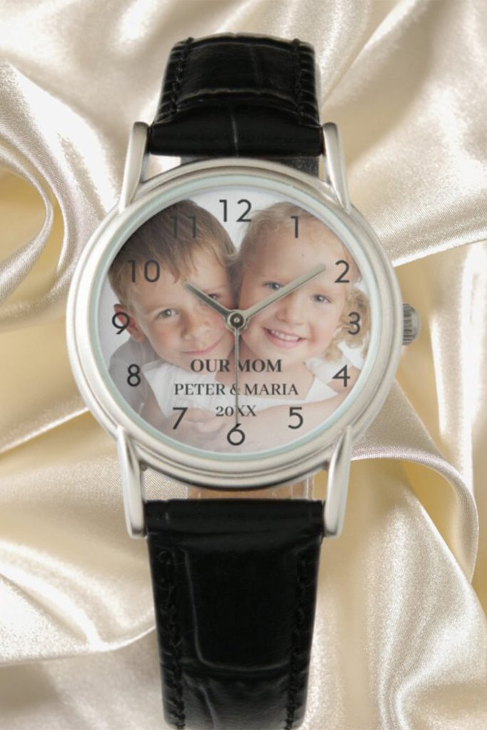Silver Watch With A Black Leather Band, Featuring A Custom Photo Of Two Children On The Dial With “Our Mom – Peter &Amp; Maria – 20Xx” Printed In The Center.