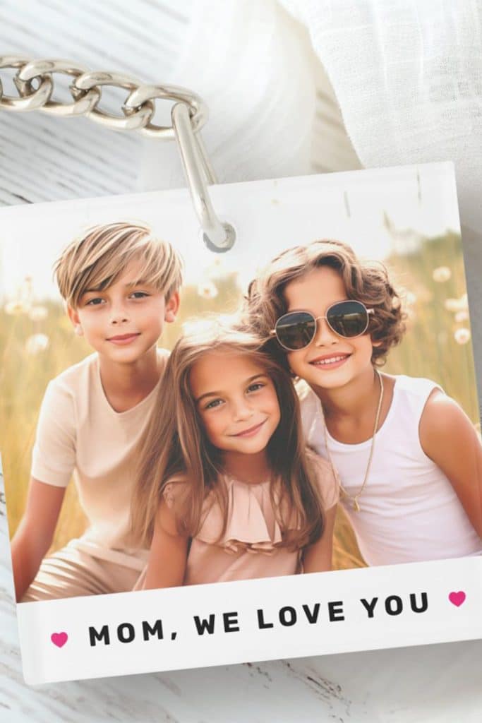 Square Photo Keychain With Three Smiling Children And The Phrase “Mom, We Love You” With Pink Heart Icons—Personalized Mother’s Day Gift.