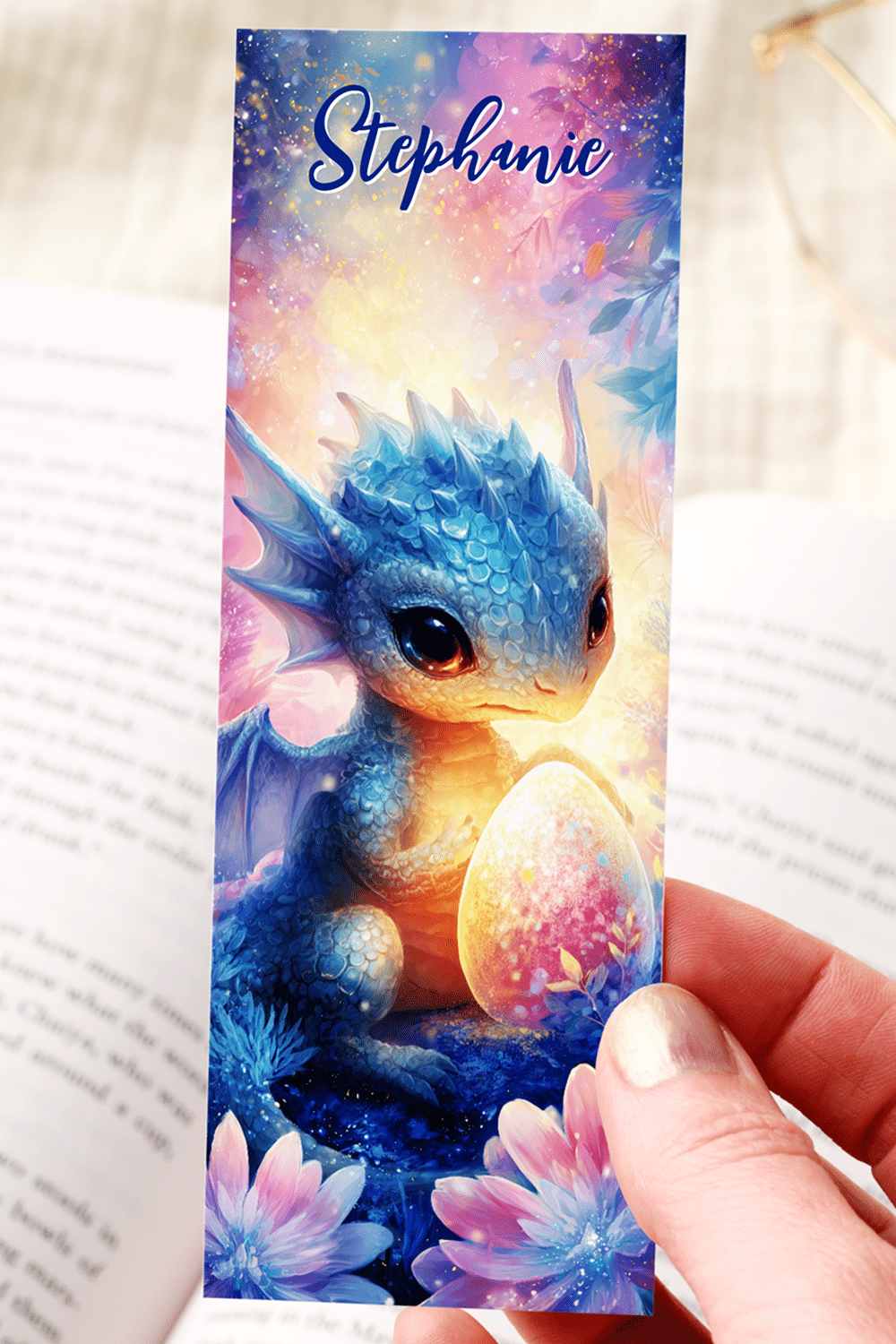 Baby Dragon With Blue And Pale Gold Scales Coiling Protectively Around A Golden Egg In A Magical Forest With Glowing Flowers.