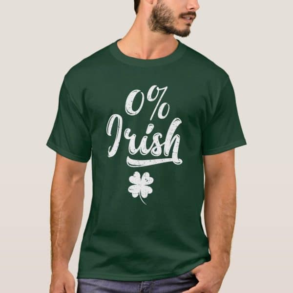 Dark Green T-Shirt With A Distressed White Design That Says 0% Irish And A Shamrock.