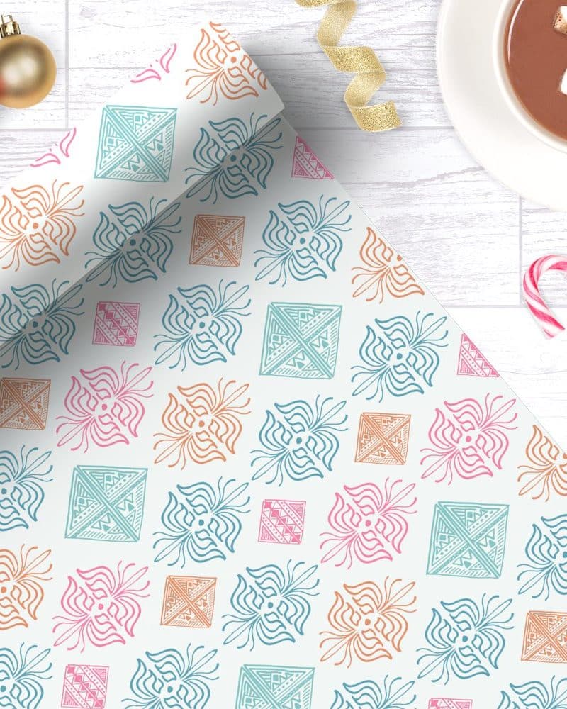 White wrapping paper with a repeating pattern of teal, pink, and orange stylized floral and geometric designs.
