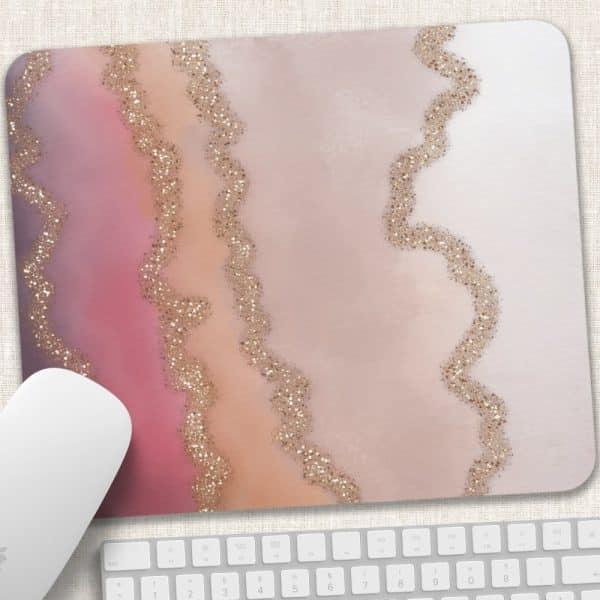 Mousepad With A Pink, Peach, And Beige Agate Design Featuring Gold Glitter Accents.
