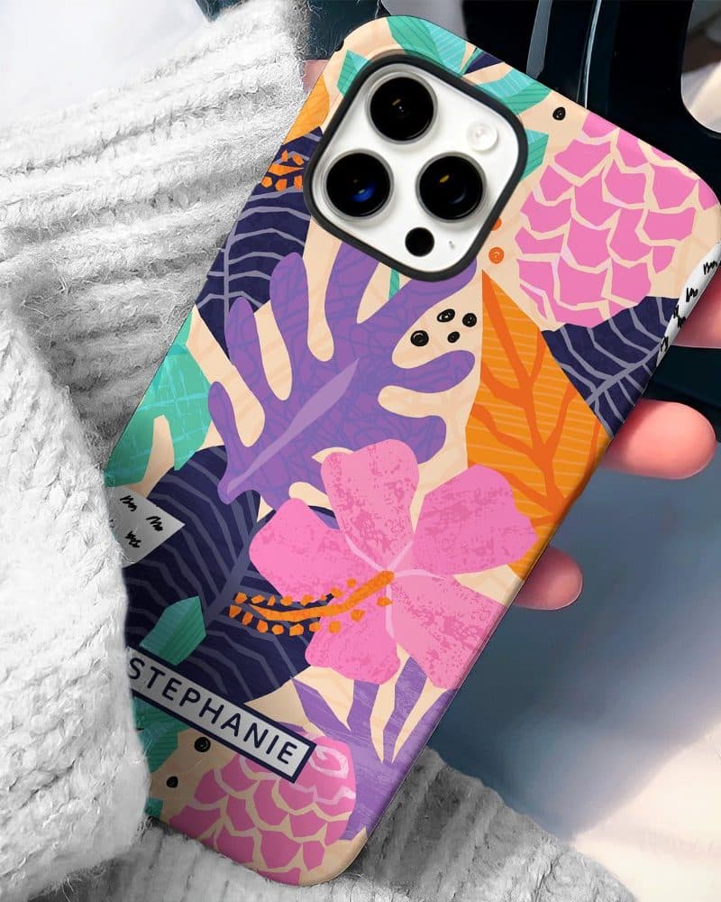 A phone case with a tropical floral design and the name Stephanie.