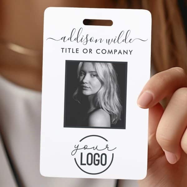 A White Id Badge With A Black And White Photo Of A Blonde Woman, The Name Addison Wilde, Space For A Title Or Company, And A Placeholder For A Logo.