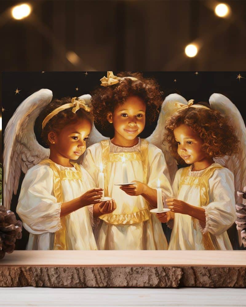 Three Black angels, each holding a lit candle, stand together with their wings spread.