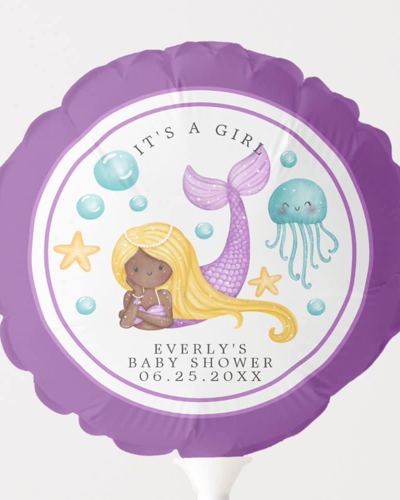 Purple balloon featuring a mermaid with long blonde hair, a jellyfish, and text announcing a baby girl's shower.