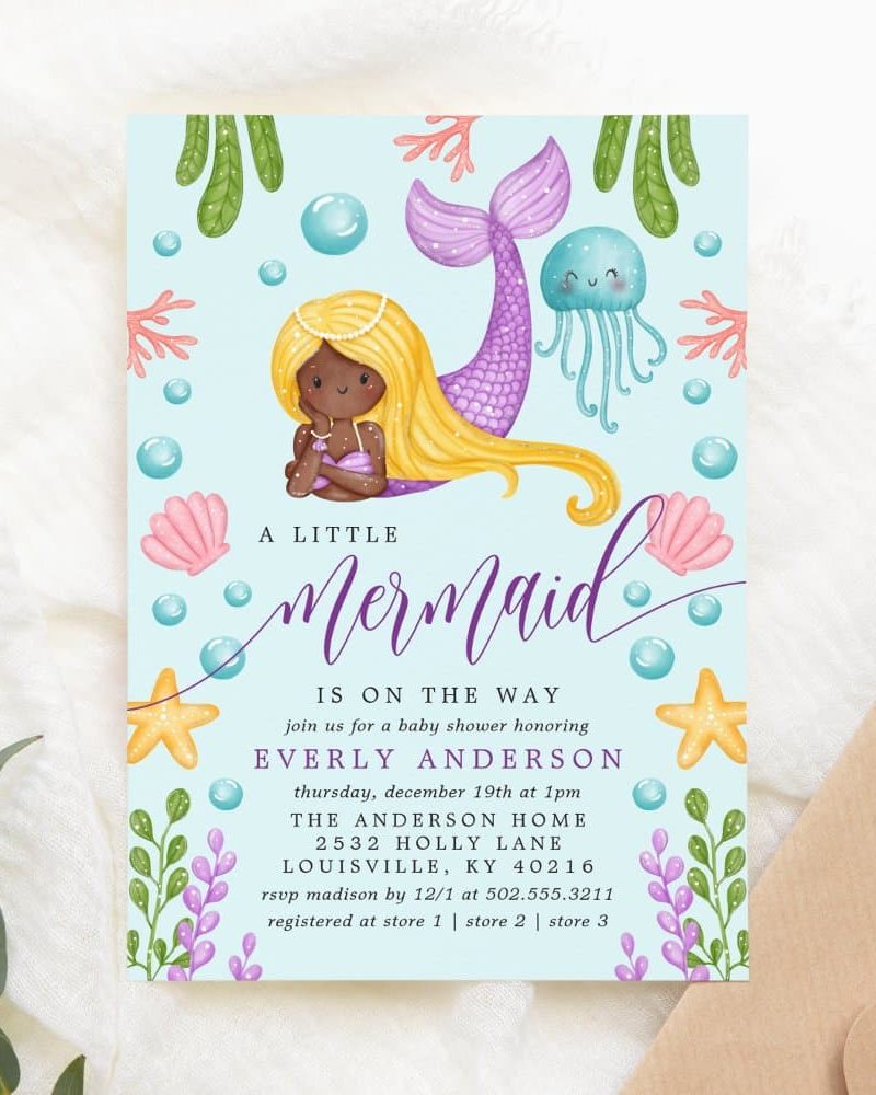 Baby shower invitation featuring a cartoon mermaid with long blonde hair and purple tail.