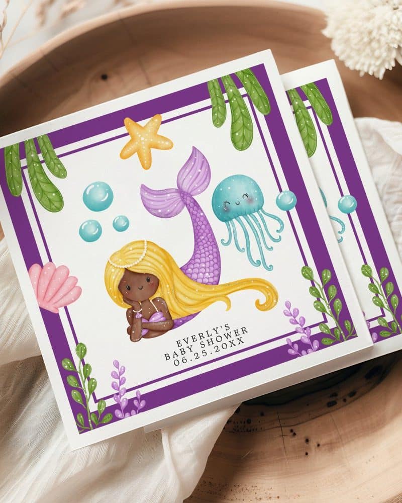 Baby shower invitation featuring a mermaid with long blonde hair and purple tail.