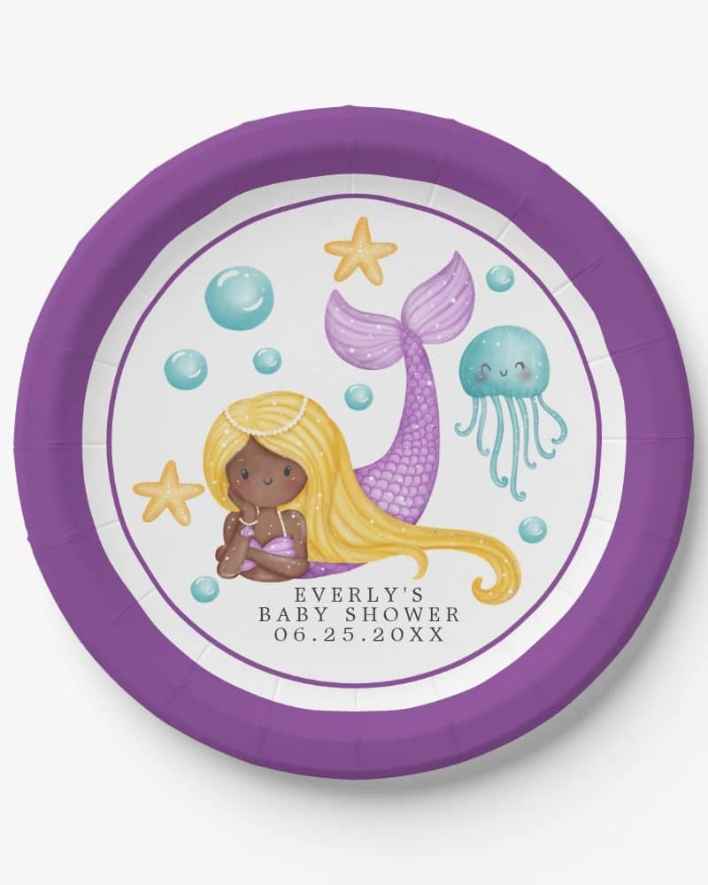 Purple paper plate with a drawing of a mermaid with long blonde hair and a purple tail.