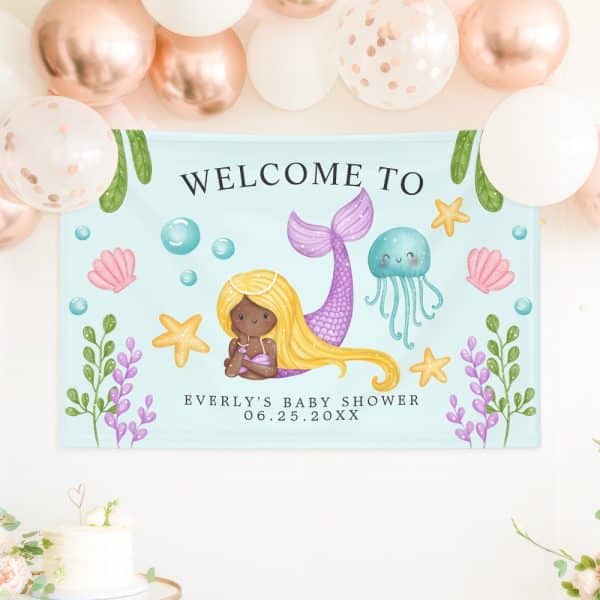 Baby Shower Banner Featuring A Mermaid With Long Blonde Hair And A Purple Tail. The Banner Also Includes Seashells, Starfish, And A Jellyfish.