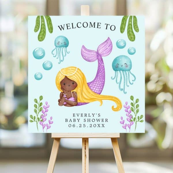Baby Shower Welcome Sign Featuring A Mermaid With Long Blonde Hair And A Purple Tail.