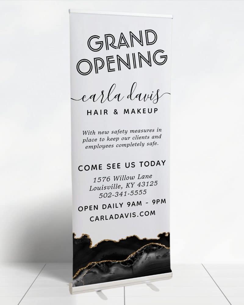 Grand opening banner for Carla Davis Hair & Makeup. Includes address and hours.