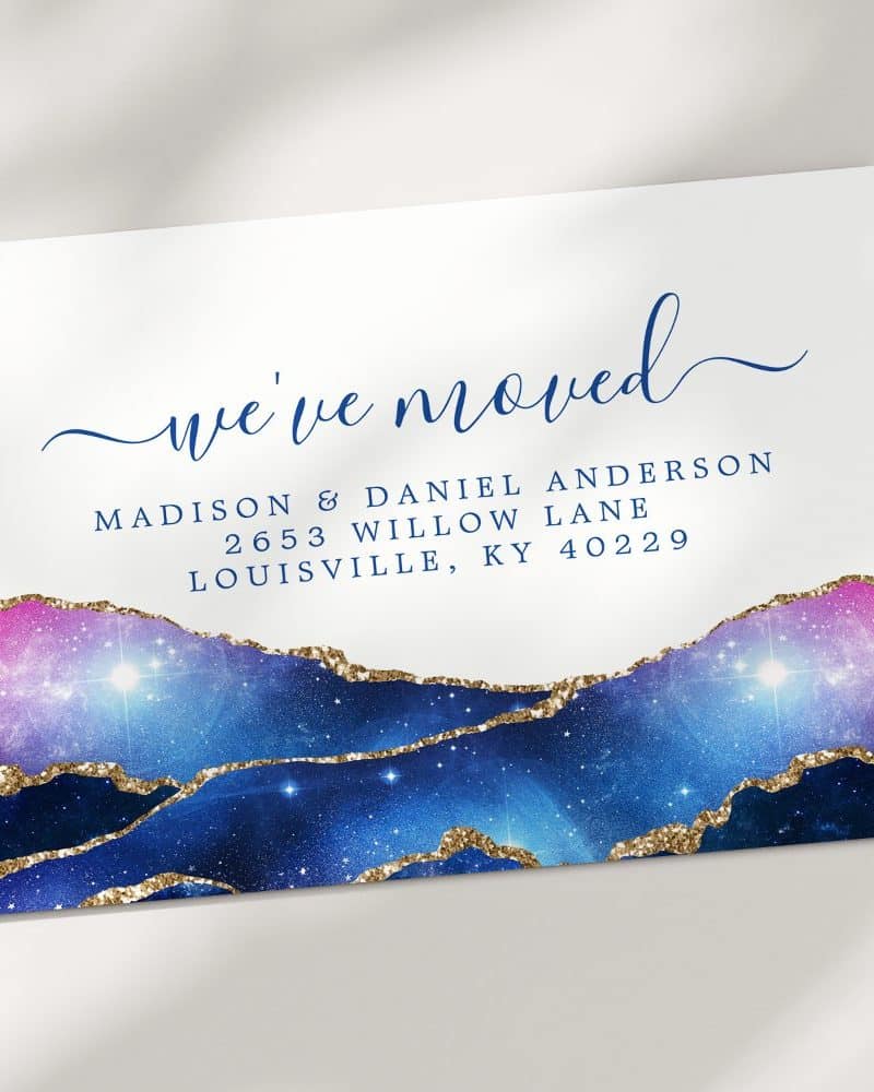 Change of address announcement card with a galaxy design.
