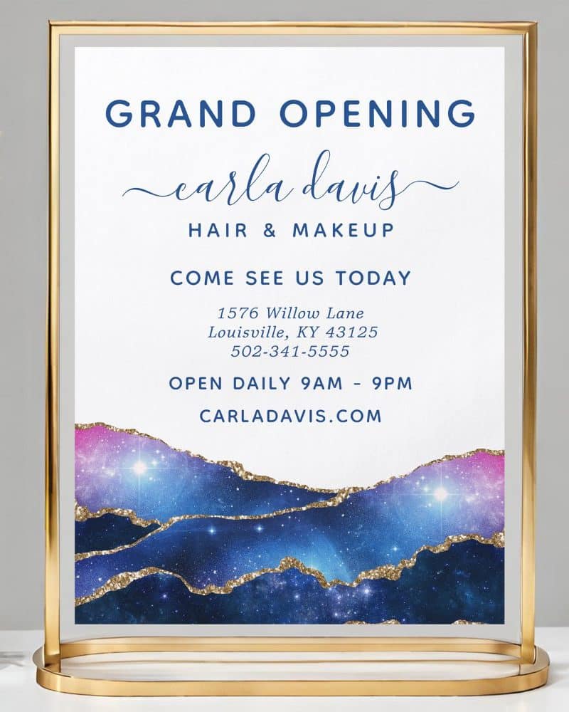 Grand opening sign for Carla Davis Hair & Makeup, showing address, phone number, and website.