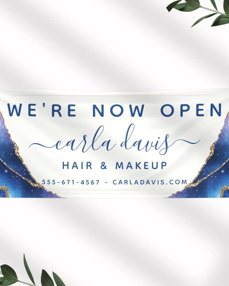 Grand opening banner for Carla Davis Hair & Makeup, featuring a galaxy-themed design.