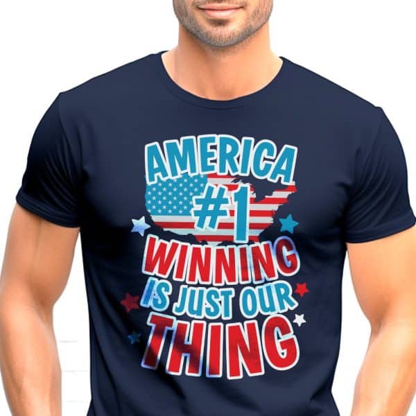 A Navy Blue T-Shirt Displaying A Patriotic Graphic. The Design Features An American Flag, The Number One, And The Text America Winning Is Just Our Thing.