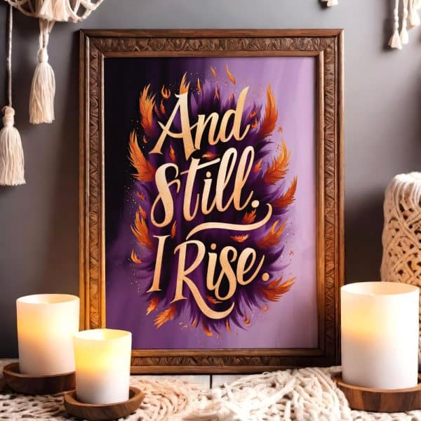 Framed Art Print With Gold Lettering On A Purple Background That Reads And Still I Rise.