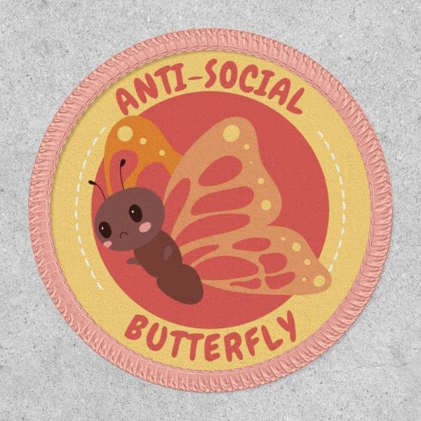 Circular Anti-Social Butterfly Patch With A Cartoon Butterfly Illustration.