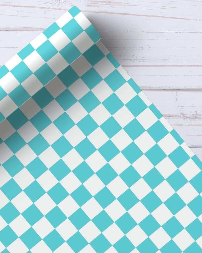 Roll of teal and white checkered wrapping paper.