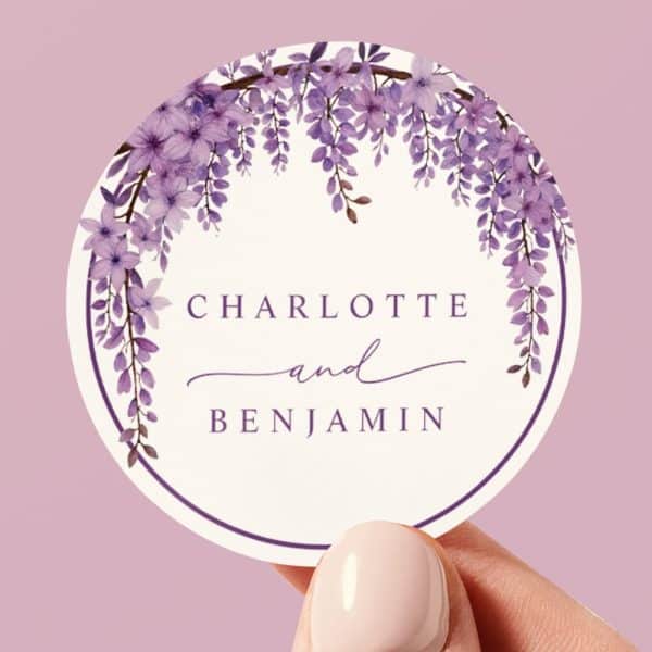 Round Sticker With Purple Wisteria Flowers Forming A Wreath Around The Names Charlotte And Benjamin.