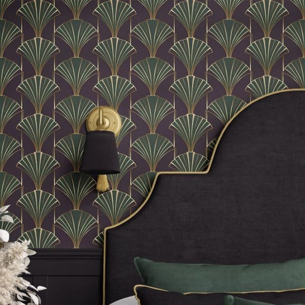 Dark Purple Art Deco Wallpaper With Gold And Green Accents Featuring A Repeating Fan Pattern, Partially Visible Behind A Dark Headboard.