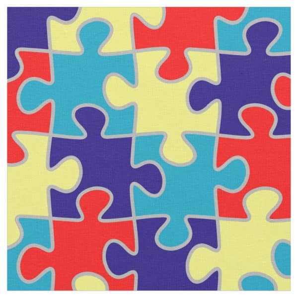 Interlocking Puzzle Pieces In Red, Blue, Yellow, And Purple.