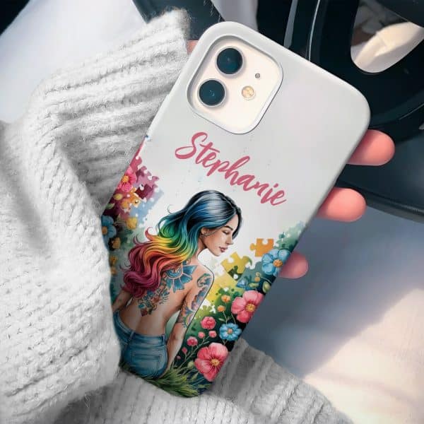 White Phone Case With The Name Stephanie, Featuring An Illustration Of A Woman With Rainbow Hair And A Back Tattoo, Surrounded By Flowers And Puzzle Pieces.
