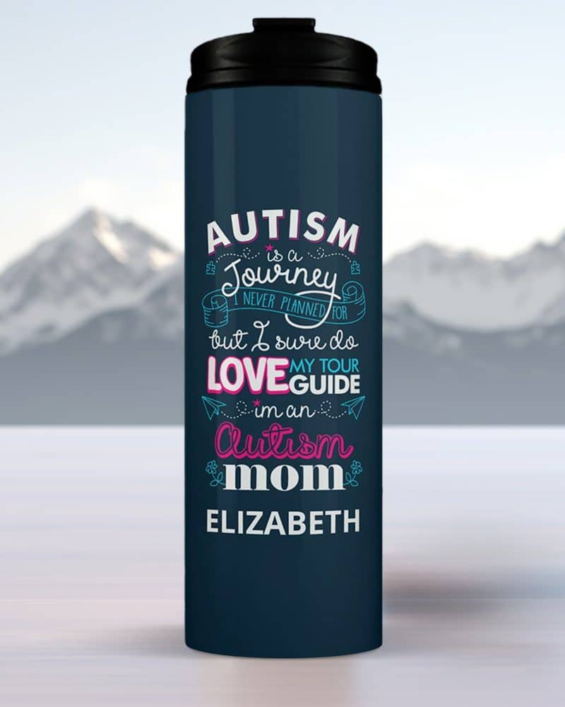 Dark blue travel mug with the text Autism is a journey I never planned for but I sure do love my tour guide in an Autism mom Elizabeth.