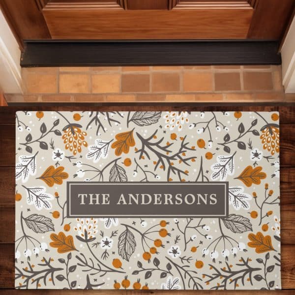 Doormat With A Floral Design And The Name The Andersons.