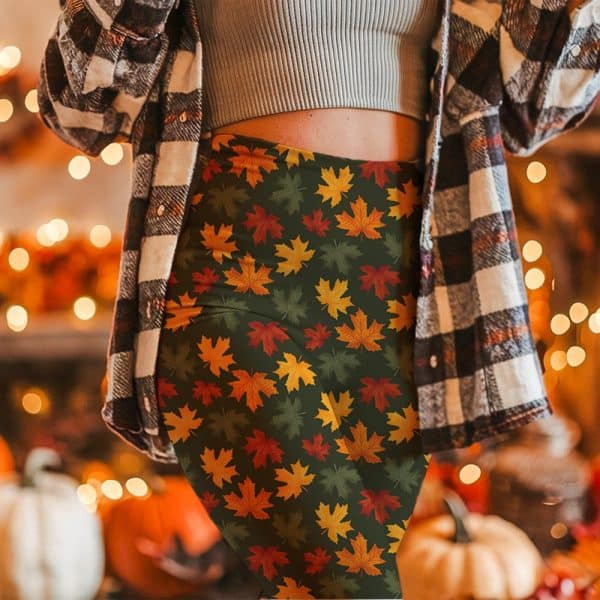 Autumn Leaf Leggings On A Person'S Lower Body.