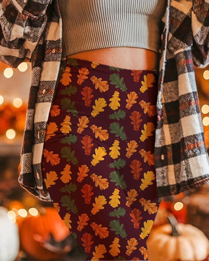 Autumn leaf leggings on a woman.
