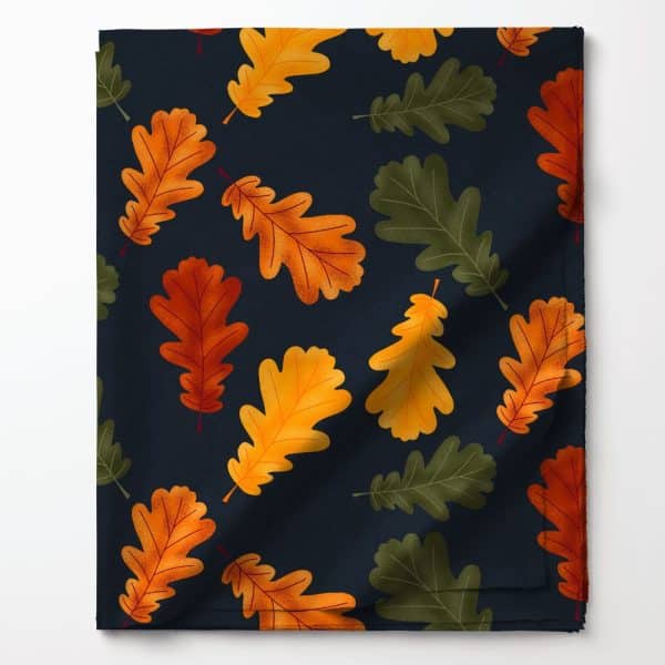 Dark Blue Fabric With A Pattern Of Orange, Gold, And Green Oak Leaves.