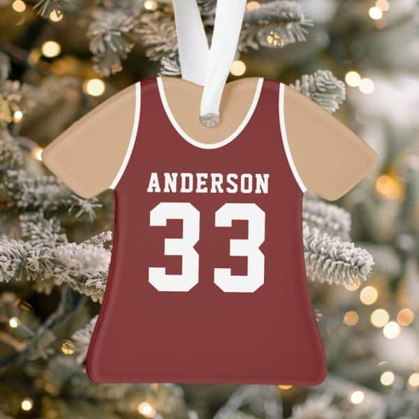 A Maroon Basketball Jersey Ornament With The Name Anderson And Number 33.