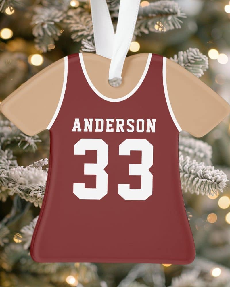 A maroon basketball jersey ornament with the name Anderson and number 33.