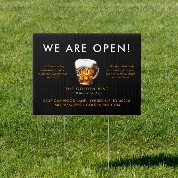 A Black And Gold Sign Announcing The Golden Pint Is Open, Offering Craft Beer And Food. A Beer Mug Graphic Is Included.