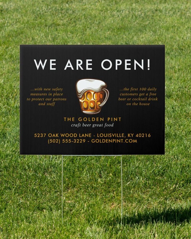 A black and gold sign announcing The Golden Pint is open, offering craft beer and food. A beer mug graphic is included.