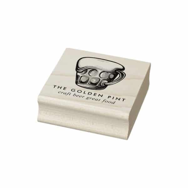 Wooden Stamp Featuring A Beer Mug Graphic And The Text The Golden Pint Craft Beer Great Food.