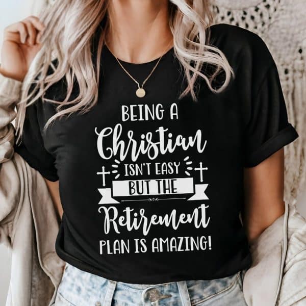 Black T-Shirt With White Text That Says, Being A Christian Isnt Easy But The Retirement Plan Is Amazing.
