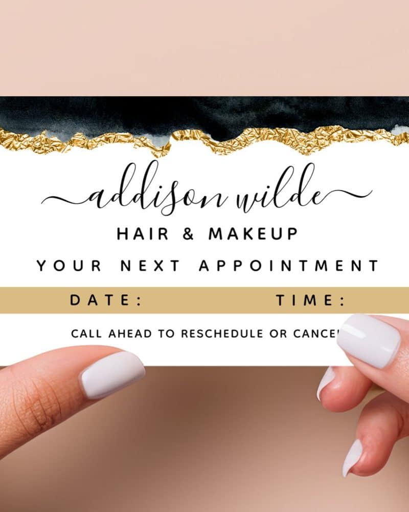 Appointment card for Addison Wilde Hair & Makeup, featuring a dark and gold design.