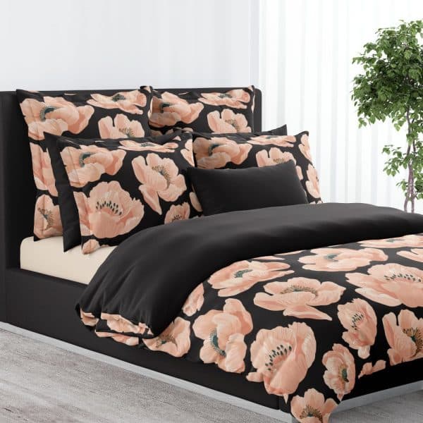 Black Duvet Cover And Pillowcases With A Peach Poppy Floral Pattern.