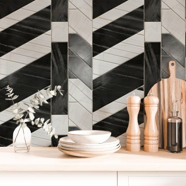 Black And White Geometric Tile Backsplash With Kitchenware.