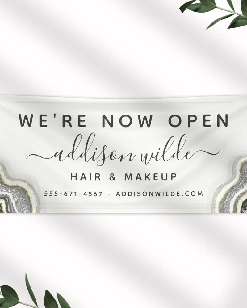 Grand opening banner for Addison Wilde Hair & Makeup. The banner features a grey and gold agate design.