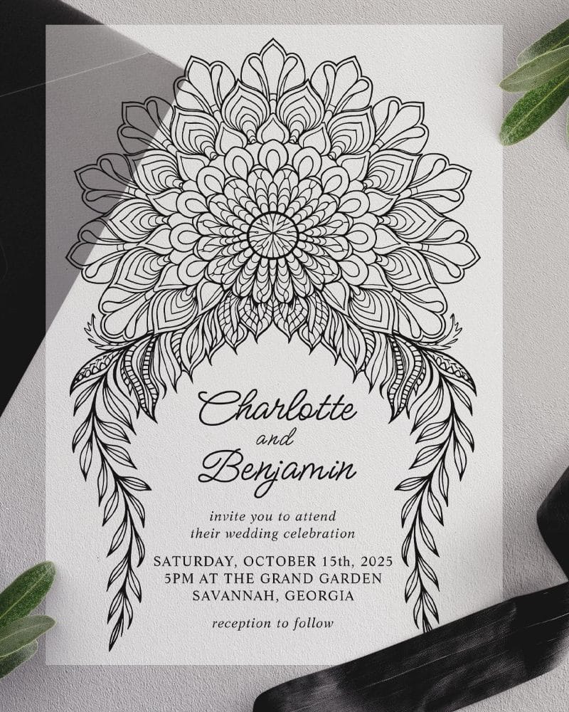 Wedding invitation featuring a large, ornate mandala design.