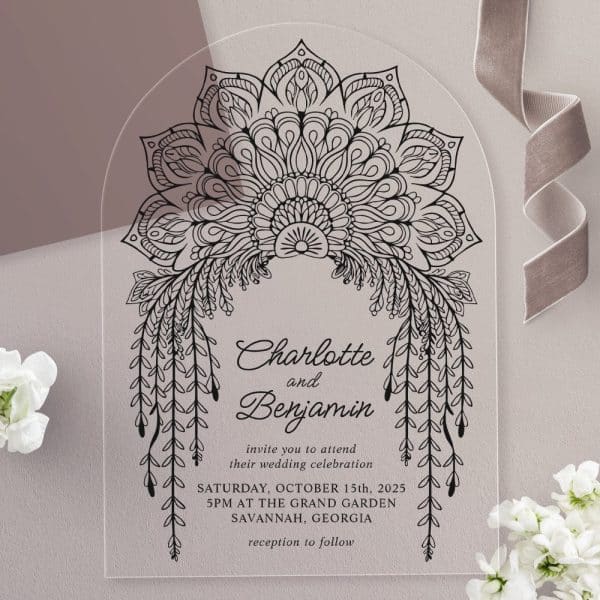 Clear Acrylic Wedding Invitation With Black Mandala Design And Names Charlotte And Benjamin, Wedding Date And Location.