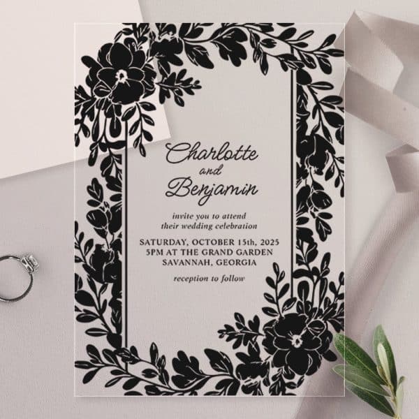 Clear Wedding Invitation With Black Floral Border, Announcing Charlotte And Benjamin'S Wedding.