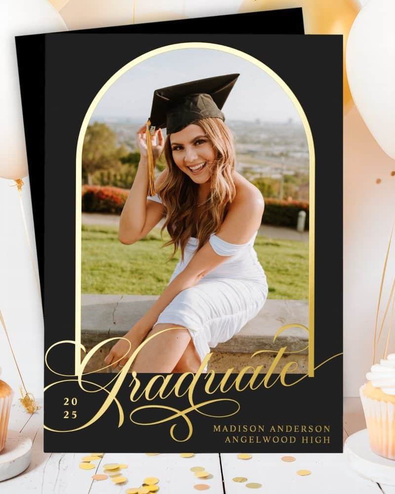 Graduation announcement featuring a smiling graduate in cap and gown.