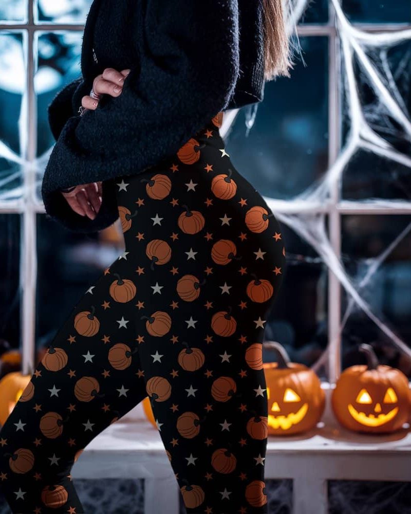 Black leggings with an orange pumpkin and white star pattern.