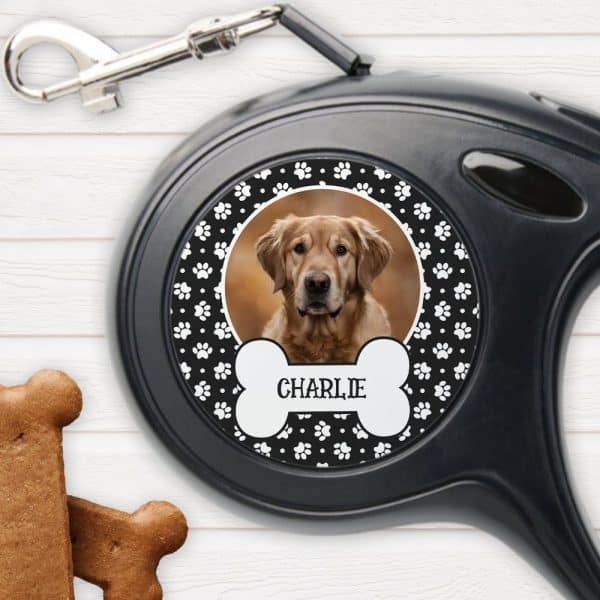 Black Retractable Dog Leash With A Custom Design Featuring A Golden Retriever'S Photo, The Name Charlie, And Paw Prints.