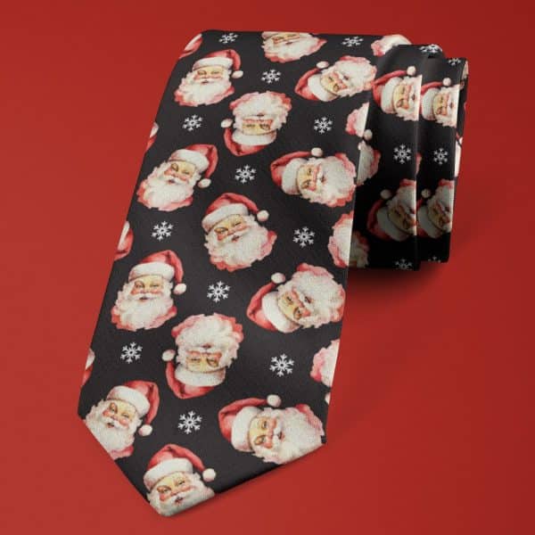 Black Necktie With A Repeating Pattern Of Santa Claus Faces And Snowflakes.