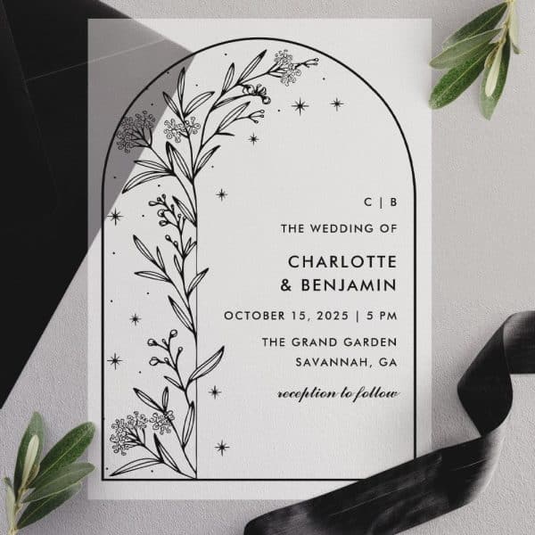 Wedding Invitation Featuring A Floral Illustration Within An Arched Border; Names And Wedding Details Are Listed Below.